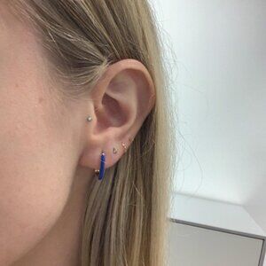 The Gia Marine gold enamel blue oval hoop earrings hoops car…